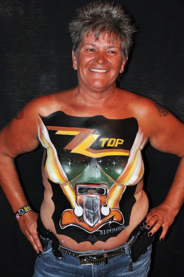 woman with a chest and torso body painting of the zz top eliminator album cover
